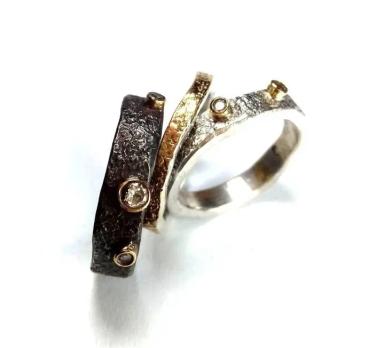 Argollas en juego, plata ,oro, circones. - vista 3